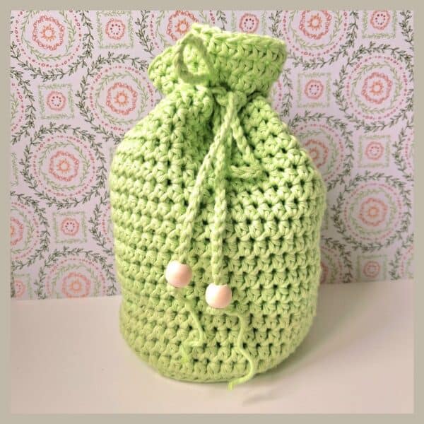 buideltasje van katoen in pastel groen